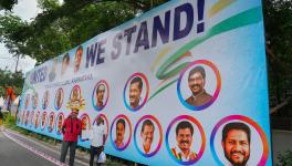 A poster of opposition leaders put up outside the venue of the united opposition meeting, in Bengaluru, Monday, July 17, 2023.