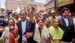 Advocates and petitioners from the Hindu side in the Gyanvapi mosque-Shringar Gauri case raise slogans as they come out of the mosque premises, in Varanasi, Monday, July 24, 2023.