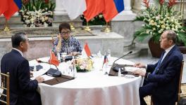 Indonesia’s Foreign Minister Retno Marsudi (C) with Director of Foreign Affairs Commission of Communist Party of China Central Committee Wang Yi (L) and Russia’s Foreign Minister Sergey Lavrov (R) at trilateral meeting, Jakarta, July 12, 2023