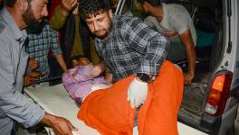 An injured non-local labourer being brought to SMHS hospital for treatment after he along with two others was shot at by militants in J&K's Shopian, in Srinagar, Thursday, July 13, 2023.
