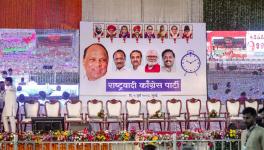  A hoarding bearing a photo of Nationalist Congress Party (NCP) chief Sharad Pawar put up at the venue of the meeting of Ajit Pawar-led NCP, in Mumbai, Wednesday, July 5, 2023. Both factions of NCP led by Maharashtra Deputy Chief Minister Ajit Pawar and NCP chief Sharad Pawar have called for separate meetings of party MLAs.