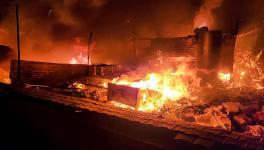 Gurugram: Flames rise from shops and other structures set ablaze by miscreants during fresh violence after Monday's attack on a procession in adjoining Nuh district, at Badshahpur area in Gurugram, Tuesday night, Aug. 1, 2023. (PTI Photo)(