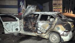 Wreckage of a vehicle that was set on fire during clashes between two groups, at Sohna in Gurugram district, Tuesday, Aug 1, 2023. The clashes erupted following an attempt to stop a VHP procession in nearby Nuh district which spread to Gurugram district.