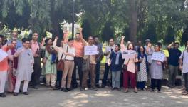 A group of people holding signs Description automatically generated  AUDFA’s protest demonstration at Karampura Campus of AUD, on 5th September. 