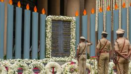 Police personnel pay tribute to the martyrs who laid down their lives while fighting terrorists during 26/11 attack, on its 15th anniversary in Mumbai, Sunday, Nov. 26, 2023.
