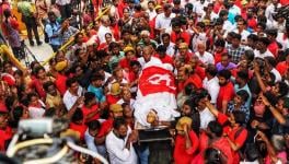 Red volunteers and CPI(M) leaders put Sankaraiah’s mortal remains to rest.