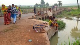 Instead of attending classes, school students fish in Punisol village, in the Jangalmahal region of West Bengal’s Bankura district. 