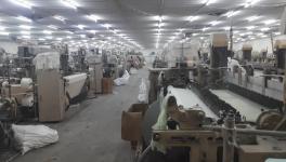Inside the textile operations that clearly show how there are much more machines than the labour available.