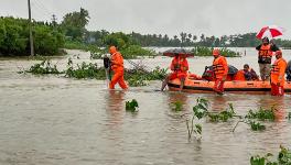 NDRF personnel conduct a rescue operation in a flooded area after heavy rainfall, in Tuticorin, Monday, Dec. 18, 2023. (PTI Photo) (PTI12_18_2023_000276B)