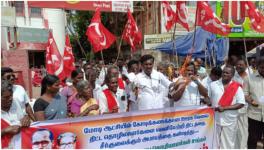 M Chinnadurai MLA, the state president of the Tamil Nadu AIAWU, leading the protest in Tiruvarur district