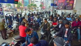 Heavy rush at a petrol pump following nationwide strike of truck drivers over new provisions regarding hit-and-run cases under Bharatiya Nyaya Sanhita, in Prayagraj, Tuesday, Jan. 2, 2024. (PTI Photo)(PTI01_02_2024_000251B)