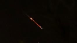 Objects lighting up the sky above Jerusalem after Iran launched drones and missiles towards Israel, April 13, 2024 