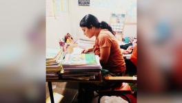 Ashwini Singh at her room studying