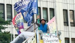 Jinsoo Koh on the overpass. Photo: Vijay Prashad