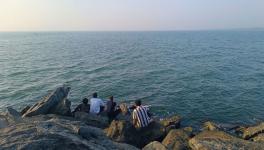 Fishermen sitting in the sun (Photo - Nisha Matamp, 101Reporters)