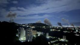 Smoke rises in Caracas, Venezuela on January 3, 2026 following a US bombing campaign. Photo via X