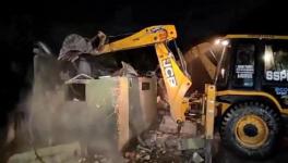 Bulldozer action at Dum Dum station area.