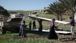 Palestinian residents of Ras Ein al-Auja village, West Bank pack up their belongings and prepare to leave their homes after deciding to flee mounting settler violence. Photo: AP