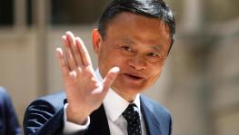 founder of Alibaba group Jack Ma arrives for the Tech for Good summit in Paris. 