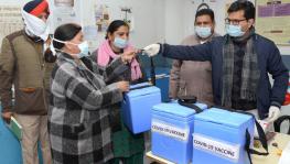 Officials of Jalandhar Civil Hospital hand over the vaccine to the staff of community health centres