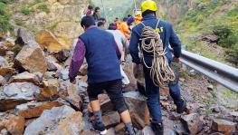 SDRF and NDRF personnel carry out a rescue operation of the tourist stranded due to the floods