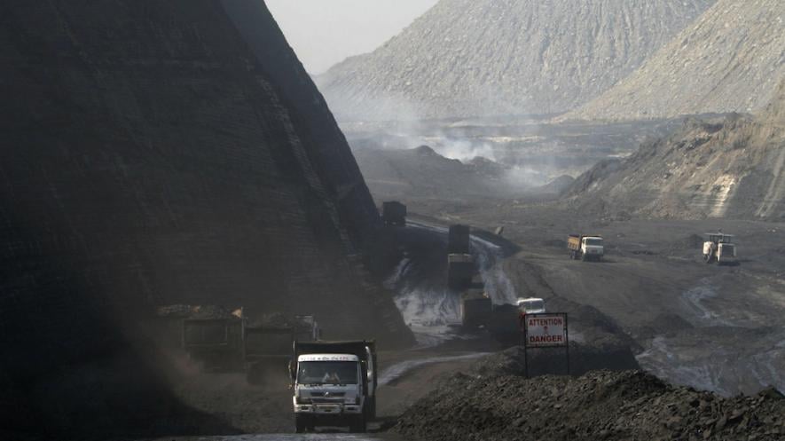 Coal laden trucks at a mine in Chhattisgarh