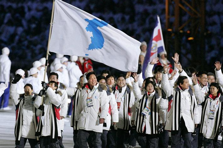 North Korea and South Korea athletes walk under an unified flag at the Winter Olympics in Pyeongchang earlier this year.