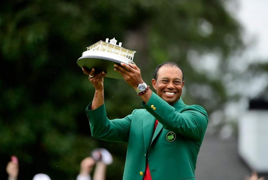 Tiger Woods celebrates with the 2019 Augusta Masters trophy