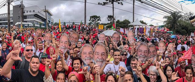 Over 10,000 people protested Sunday outside the Federal Police headquarters where Lula has been held for the last year