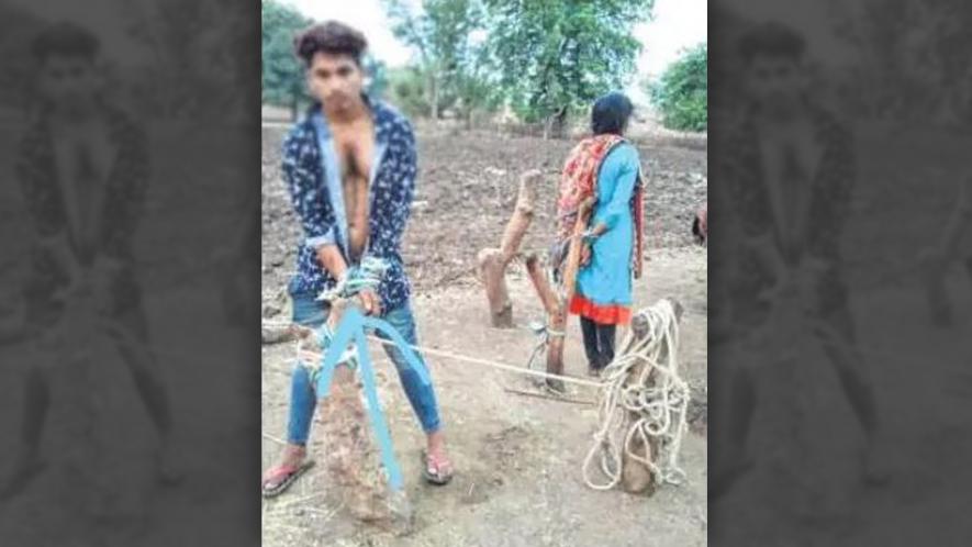 Tribal Couple Tied to Pole