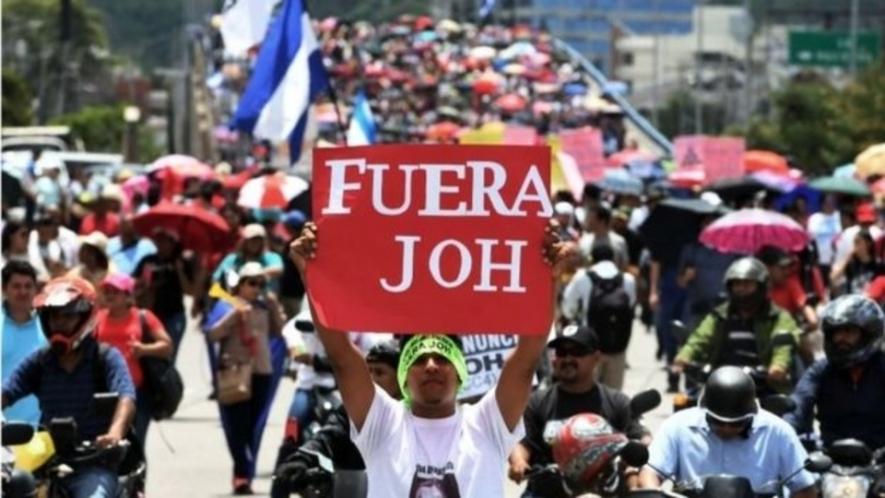 Protesters in Honduras mobilize to demand Juan Orlando Hernández resign amid drug trafficking accusations.