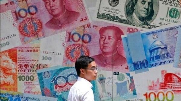 China’s Allows Yuan to Fall Below Sensitive Level of 7 to US Dollar