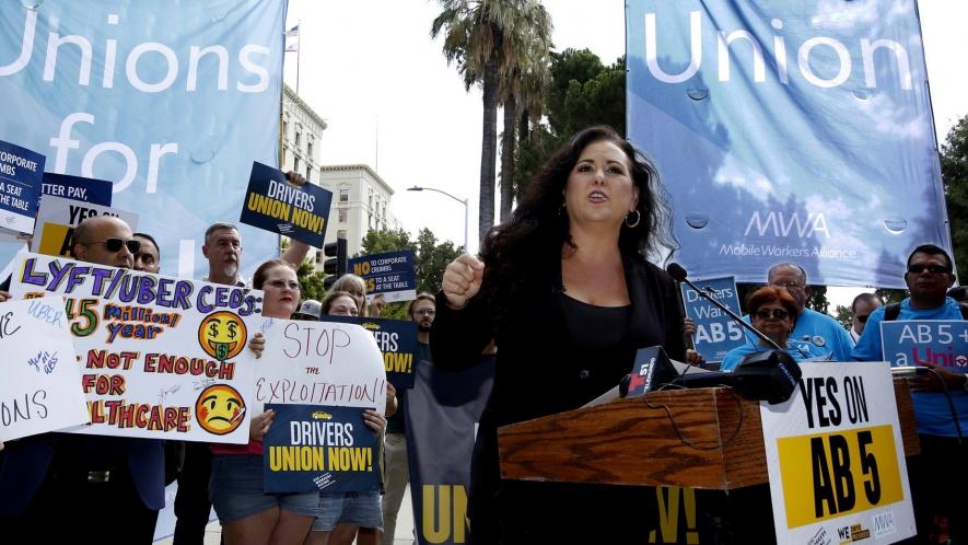 Assemblywoman Lorena Gonzalez, speaks at an August 28 rally in Sacramento, California, calling for passage of AB5 . 