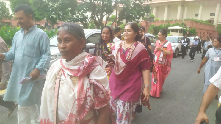 Some of the petitioners in the Supreme Court premises on Thursday.