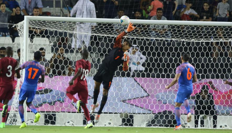 Indian football team goalkeeper Gurpreet Singh Sandhu makes a save in the FIFA World Cup qualifier against Qatar