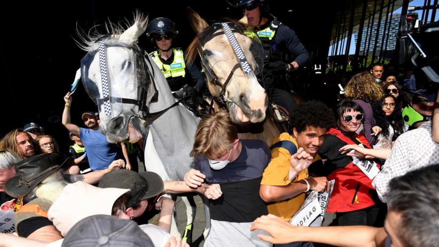 The police charged at the protesters with horses and attacked them with pepper spray.