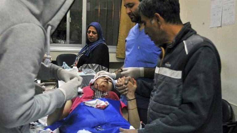 Paramedics at a hospital in Damascus treat the wounded after the Israeli missile strikes on Tuesday, November 20.