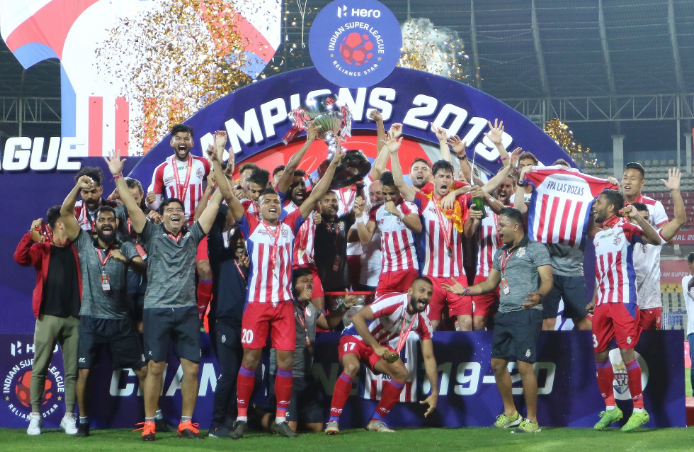 ATK FC players celebrate with the 2019-20 Indian Super League (ISL) trophy