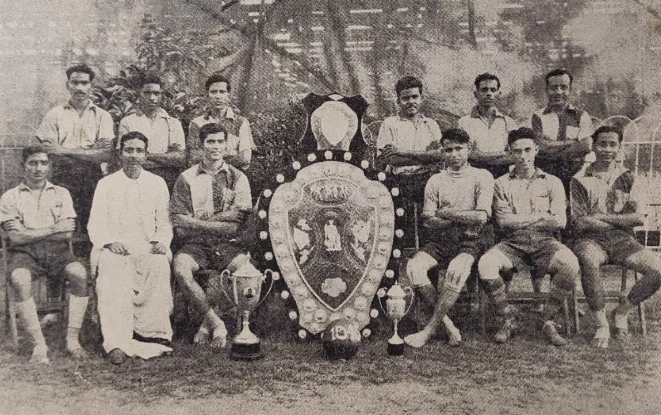 Fred Pugsley with the 1945 East Bengal football team