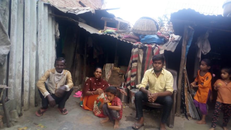 Textile workers in their homes in workers ghetto in Surat 