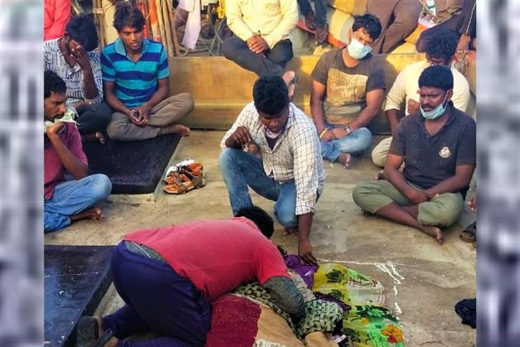 STRANDED FISHERMEN MOURNING THE DEATH OF 22-YEAR-OLD RAJU