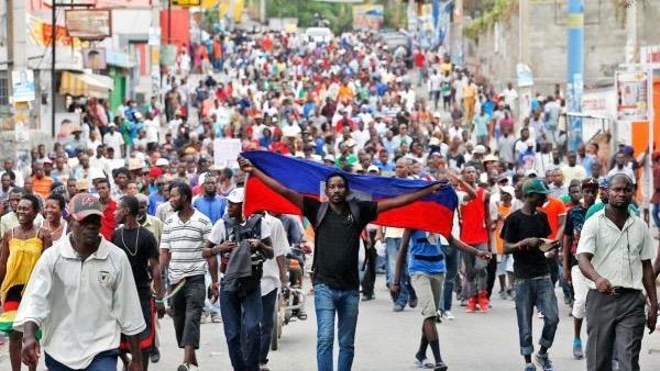 People in Haiti demand President Jovenel Moïse's resignation over mismanagement of pandemic 