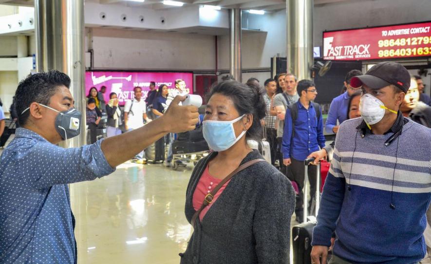 Passengers undergo a thermal screening test in the wake of novel coronavirus scare at Dimapur airport in Nagaland. (Representative image/PTI Photo) 