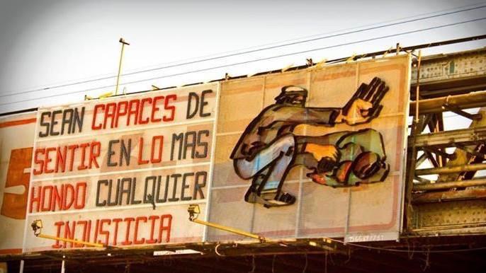 Popular art installation at the Darío and Maxi station in Buenos Aires, "Be capable of feeling any injustice deeply."