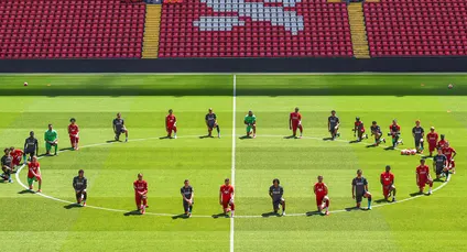 Liverpool players take the knee during training for George Floyd