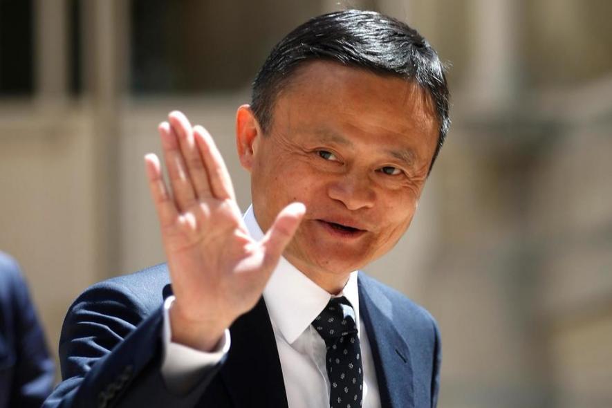 founder of Alibaba group Jack Ma arrives for the Tech for Good summit in Paris. 
