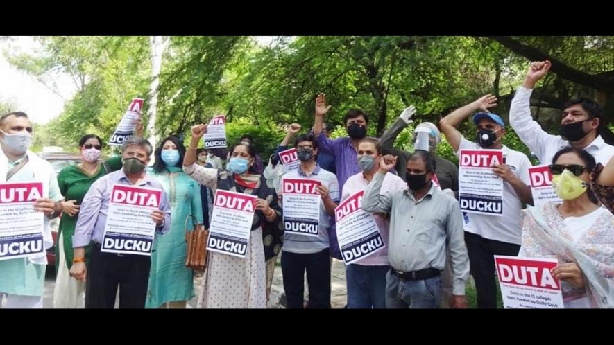 DUTA protest against delhi govt for withholding teachers and employees' salaries