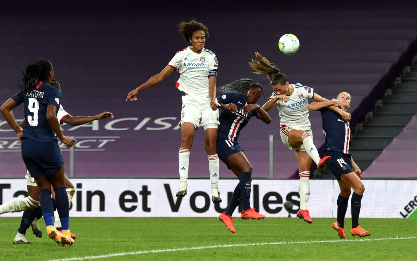 Wendie Renard of Lyon scores in the Women's Champions League semifinal
