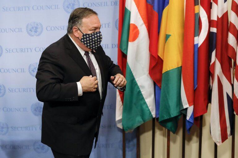 US Secretary of State Mike Pompeo wears a facemask as he departs after meeting with UN Security Council members regarding restoration of sanctions against Iran, United Nations headquarters, New York, August 20, 2020.
