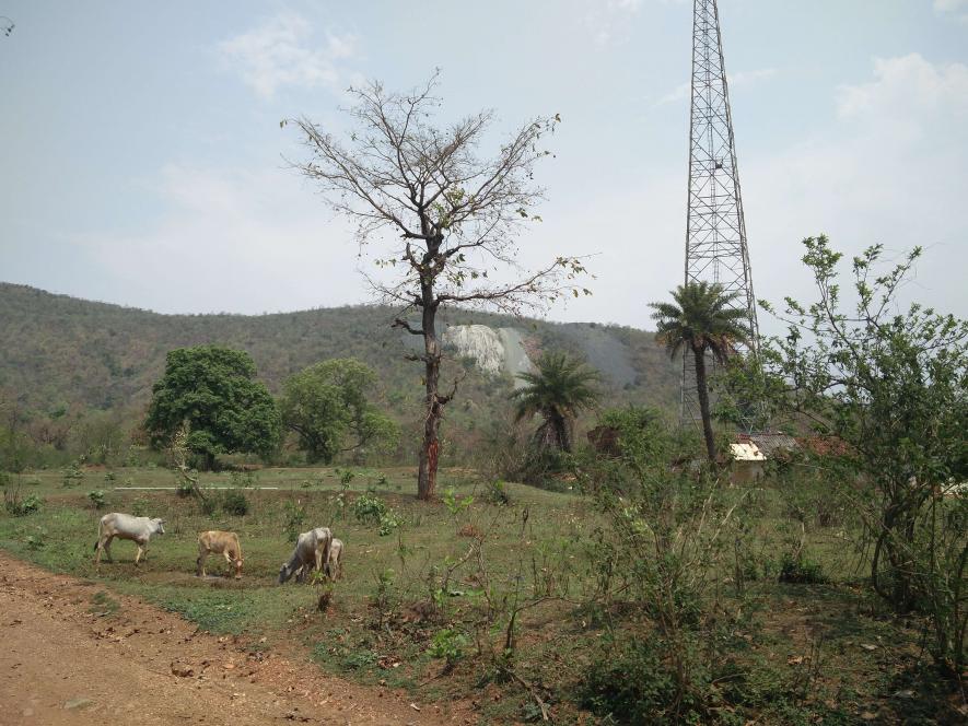 Scarred dump visible from distance